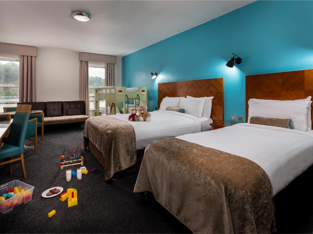 Postel nebo postele na pokoji v ubytování Treacys Hotel & Leisure Centre Waterford