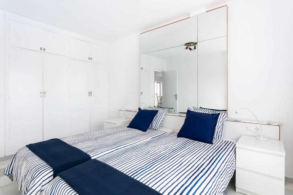Posteľ alebo postele v izbe v ubytovaní Home2Book Stunning Sea Views Adeje, Wifi & Pool