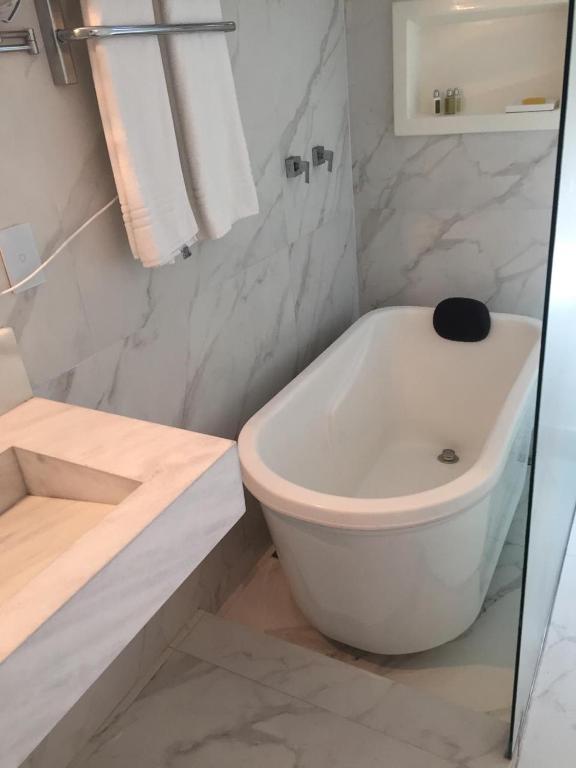 Koupelna v ubytování Apart Hotel Delphin Guaruja