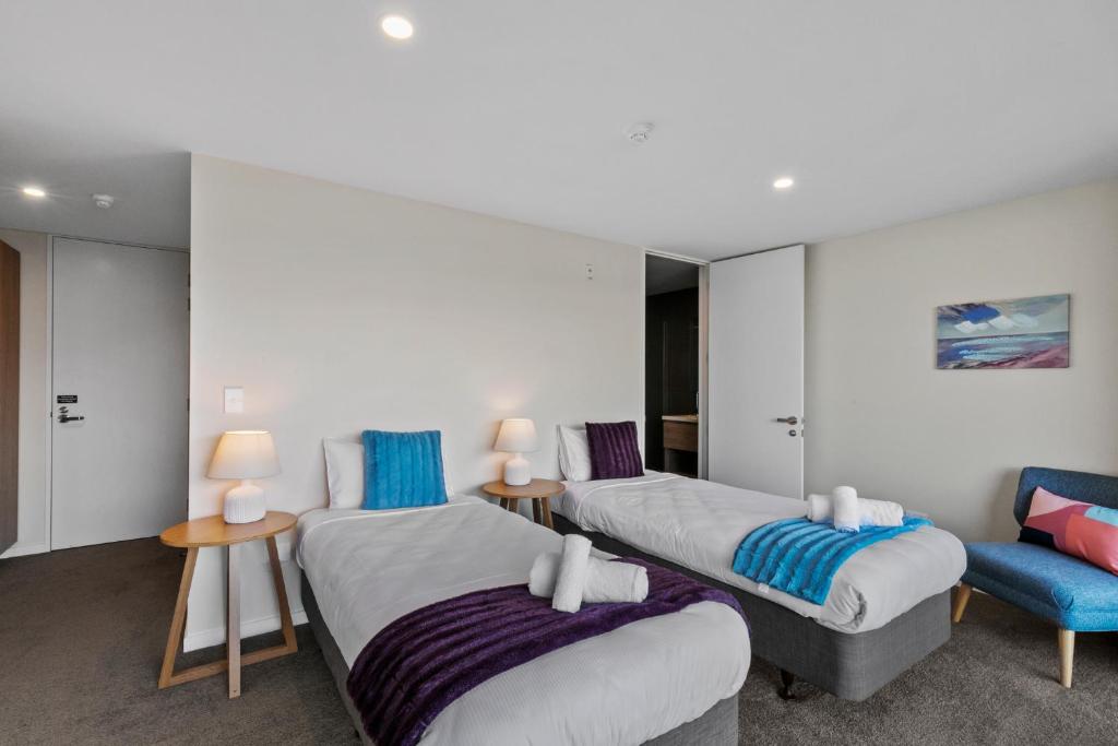 Ein Bett oder Betten in einem Zimmer der Unterkunft Falcon&#39;s View Queenstown