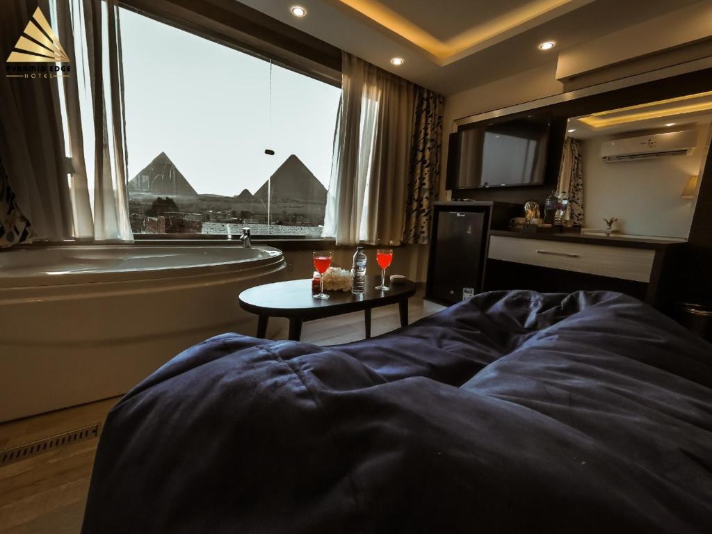Posezení v ubytování Pyramid Edge Hotel & Exclusive Pyramids View Rooftop
