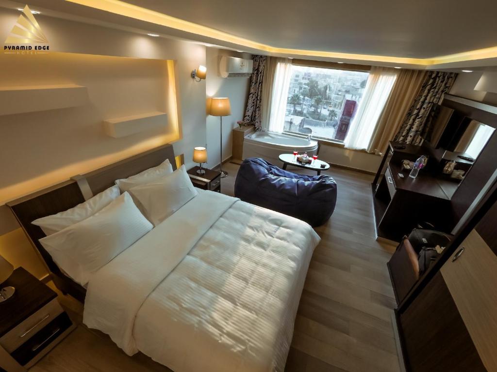 Posezení v ubytování Pyramid Edge Hotel & Exclusive Pyramids View Rooftop