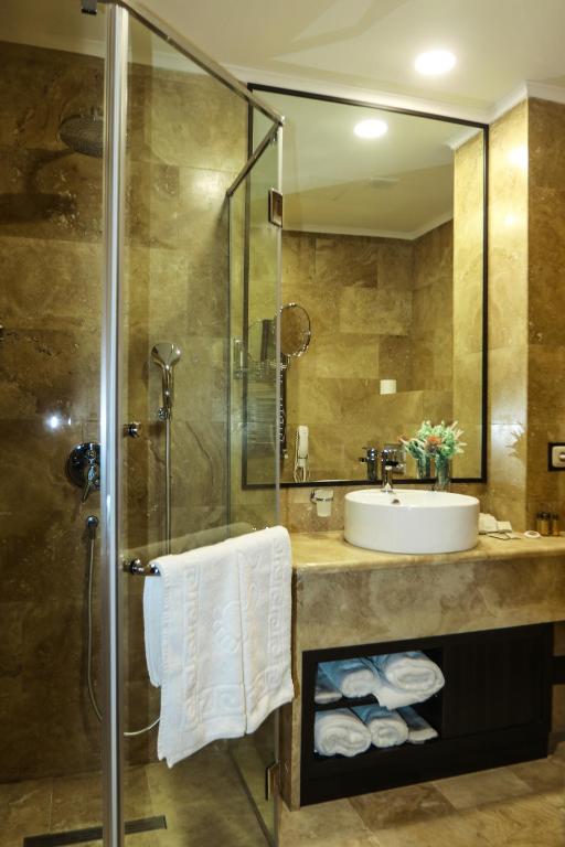 Koupelna v ubytování Konyak Hotel