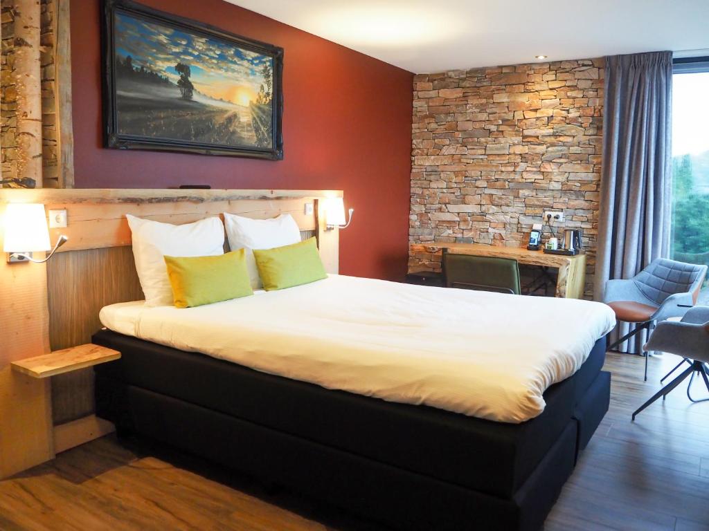 Postel nebo postele na pokoji v ubytování Boutique Hotel, Restaurant & Wellness Westerburcht