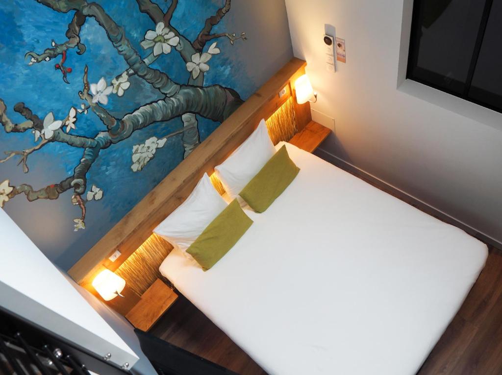 Postel nebo postele na pokoji v ubytování Boutique Hotel, Restaurant & Wellness Westerburcht