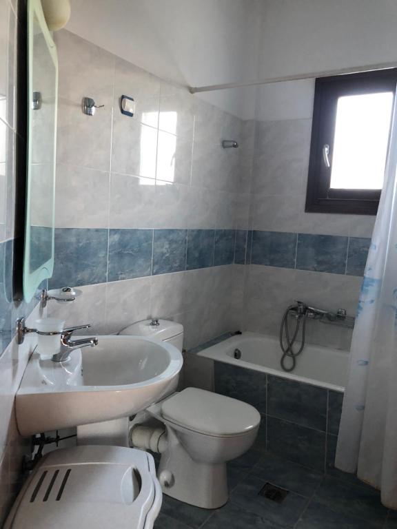 Koupelna v ubytování Kyma Hotel