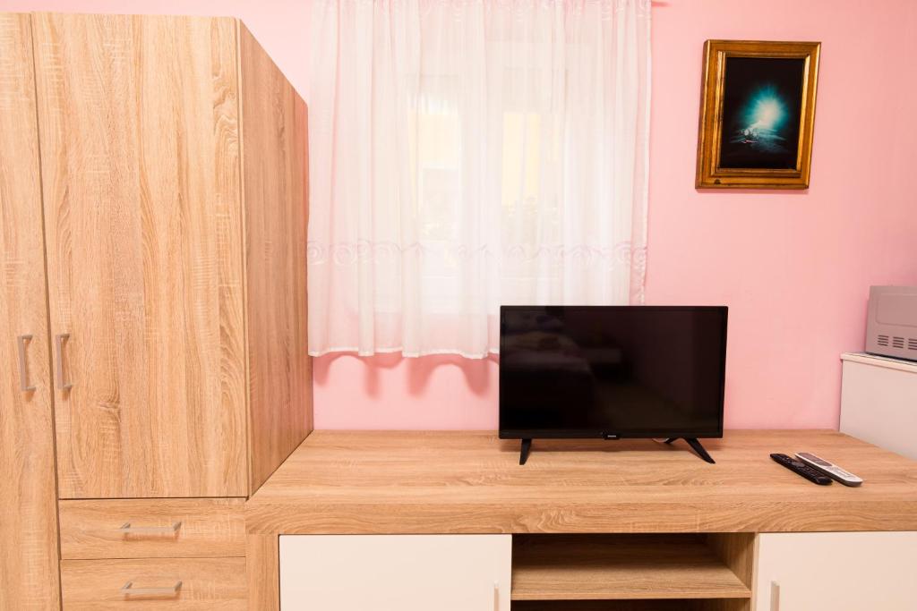 Televízia a/alebo spoločenská miestnosť v ubytovaní Lovely house