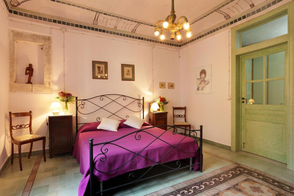 A bed or beds in a room at Casa Salomone