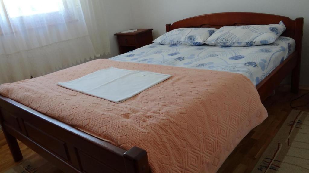 Postel nebo postele na pokoji v ubytování Guest House Milena