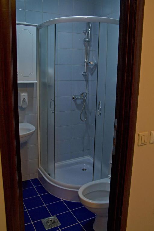 Koupelna v ubytování Garni Hotel Tri O
