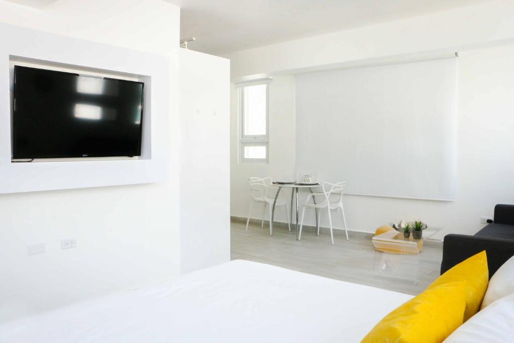 TV a/nebo společenská místnost v ubytování Avila Guesthouse
