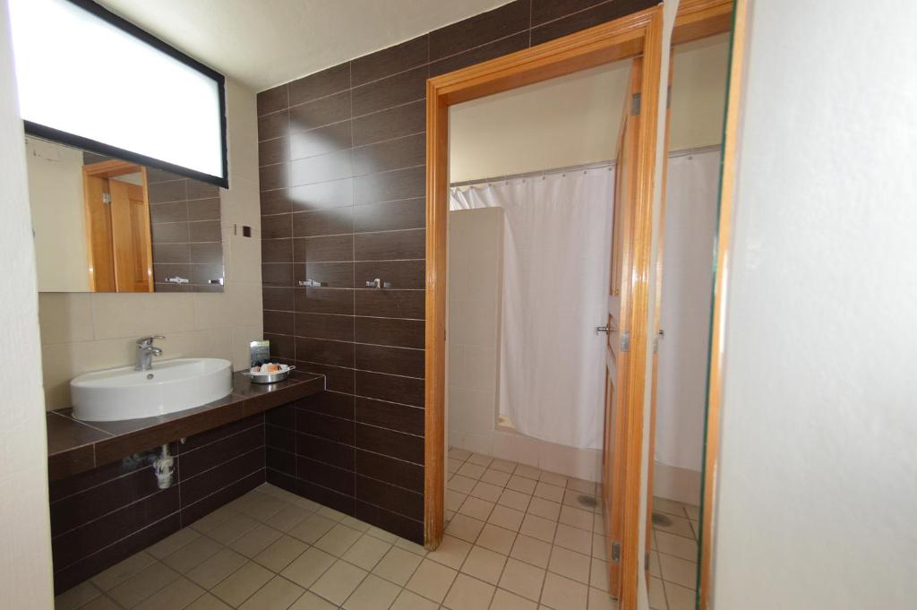 Koupelna v ubytování Centro 19 Hotel