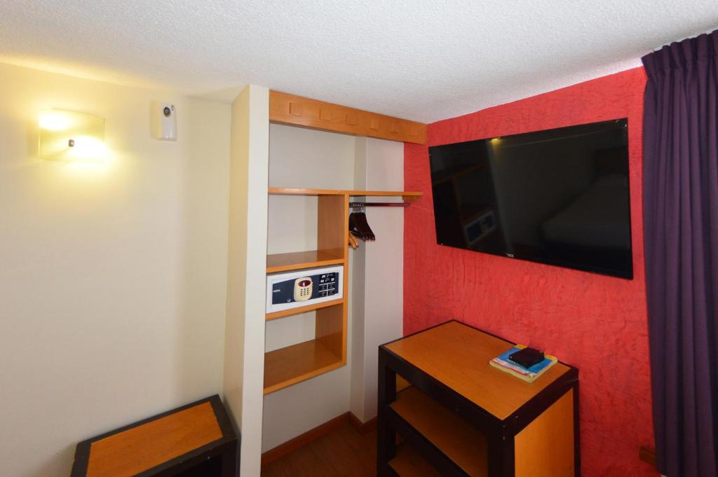 Kuchyň nebo kuchyňský kout v ubytování Centro 19 Hotel
