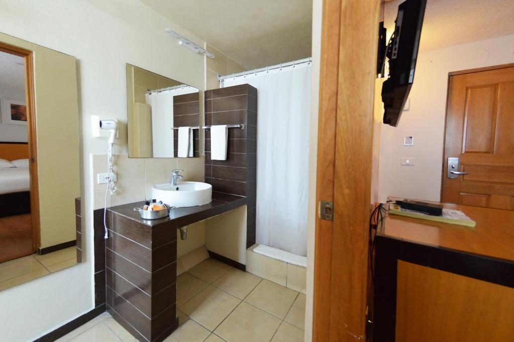 Koupelna v ubytování Centro 19 Hotel