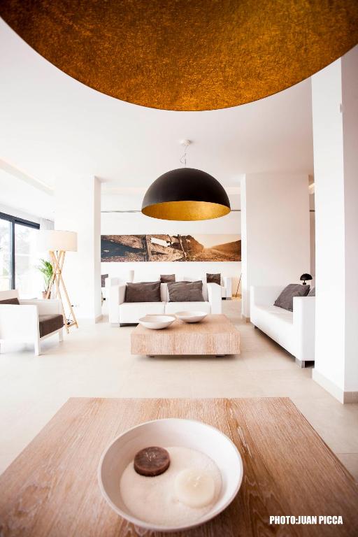 Postel nebo postele na pokoji v ubytování Hotel Cala Saona & Spa