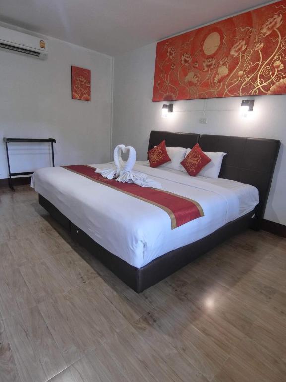 Postel nebo postele na pokoji v ubytování The Krabi Forest Homestay
