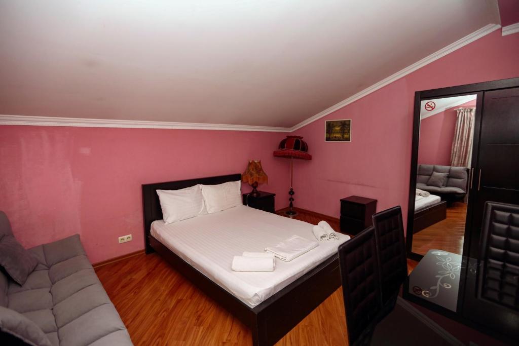 Postel nebo postele na pokoji v ubytování Hotel Isaka