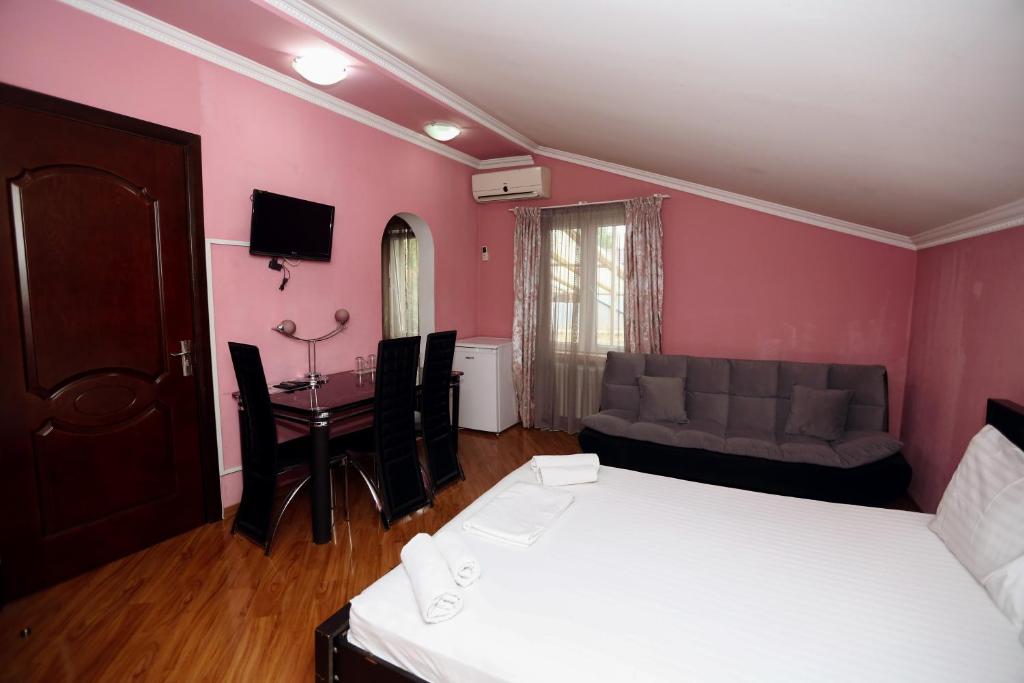 Postel nebo postele na pokoji v ubytování Hotel Isaka