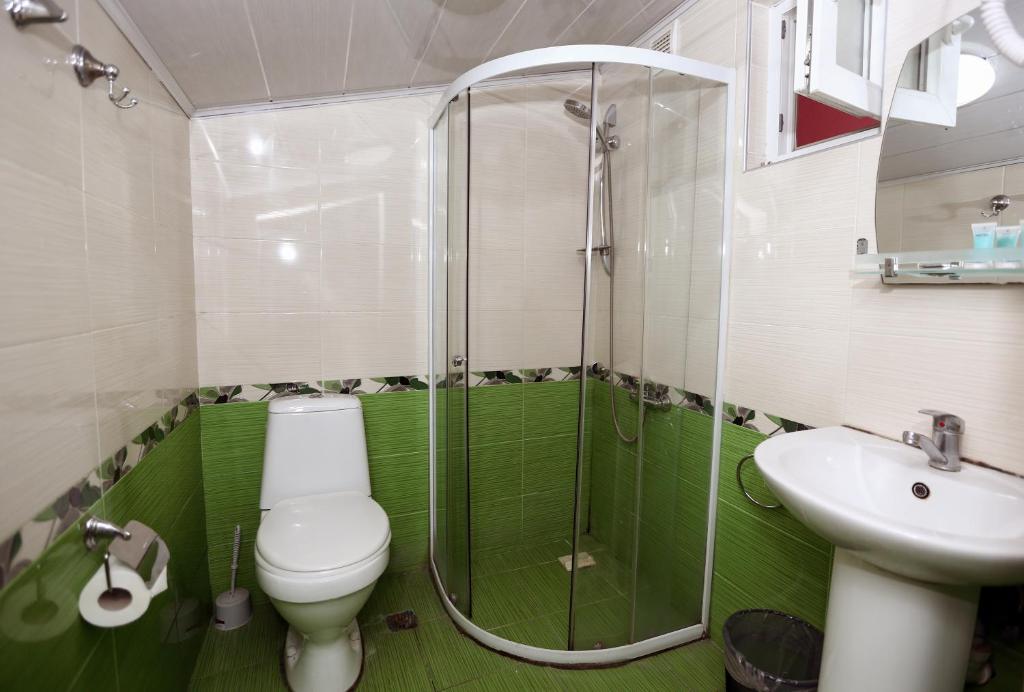 Koupelna v ubytování Hotel Isaka