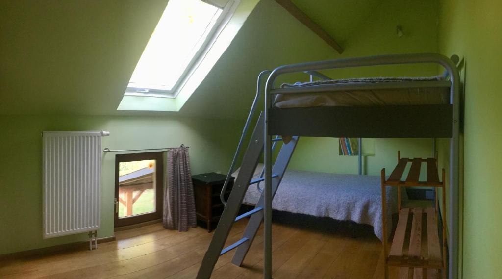 Postel nebo postele na pokoji v ubytování Gîte Saint-Martin de la Fauvette