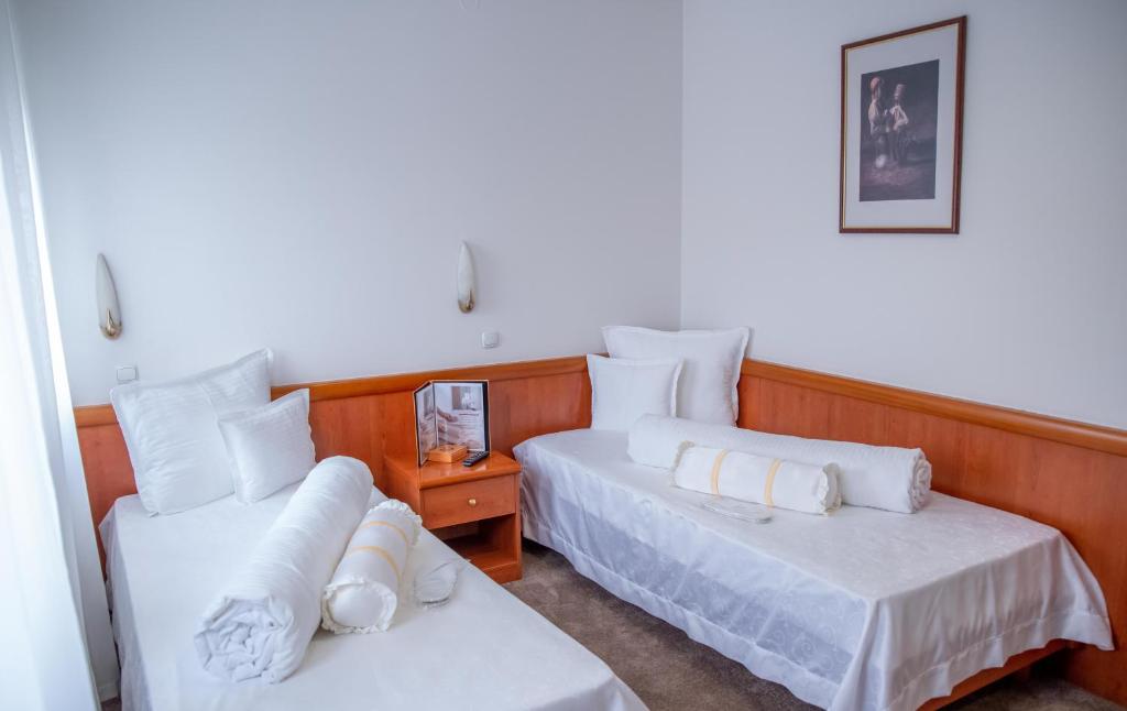 Postel nebo postele na pokoji v ubytování Hotel Integra