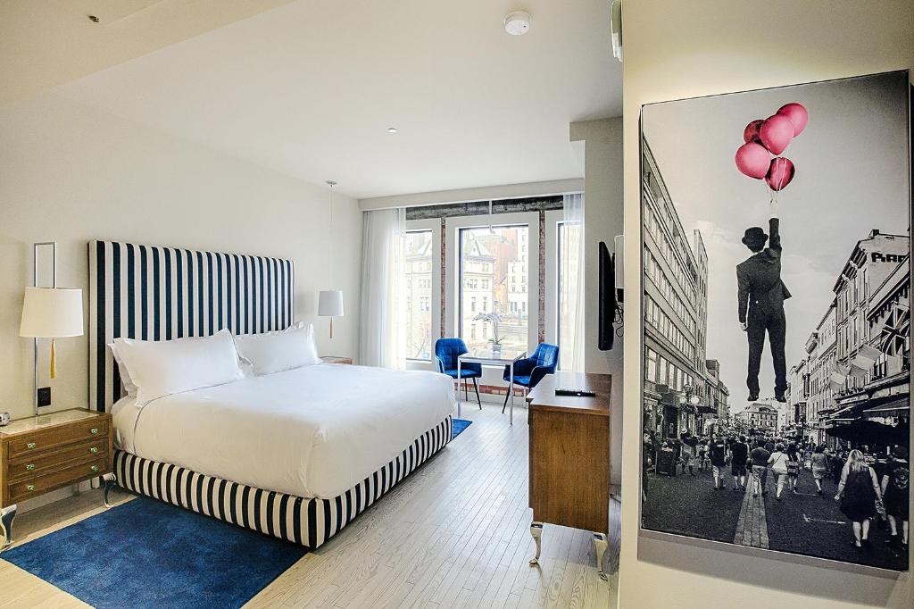 Postel nebo postele na pokoji v ubytování Monsieur Jean - Hôtel Particulier