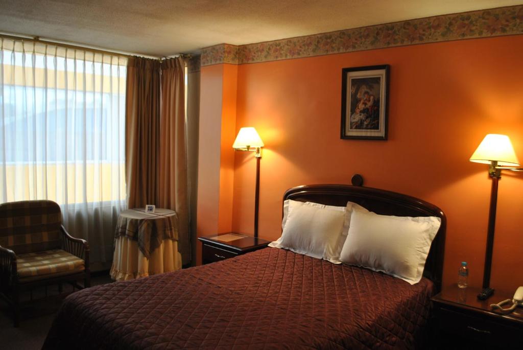 Postel nebo postele na pokoji v ubytování Hotel Makroz