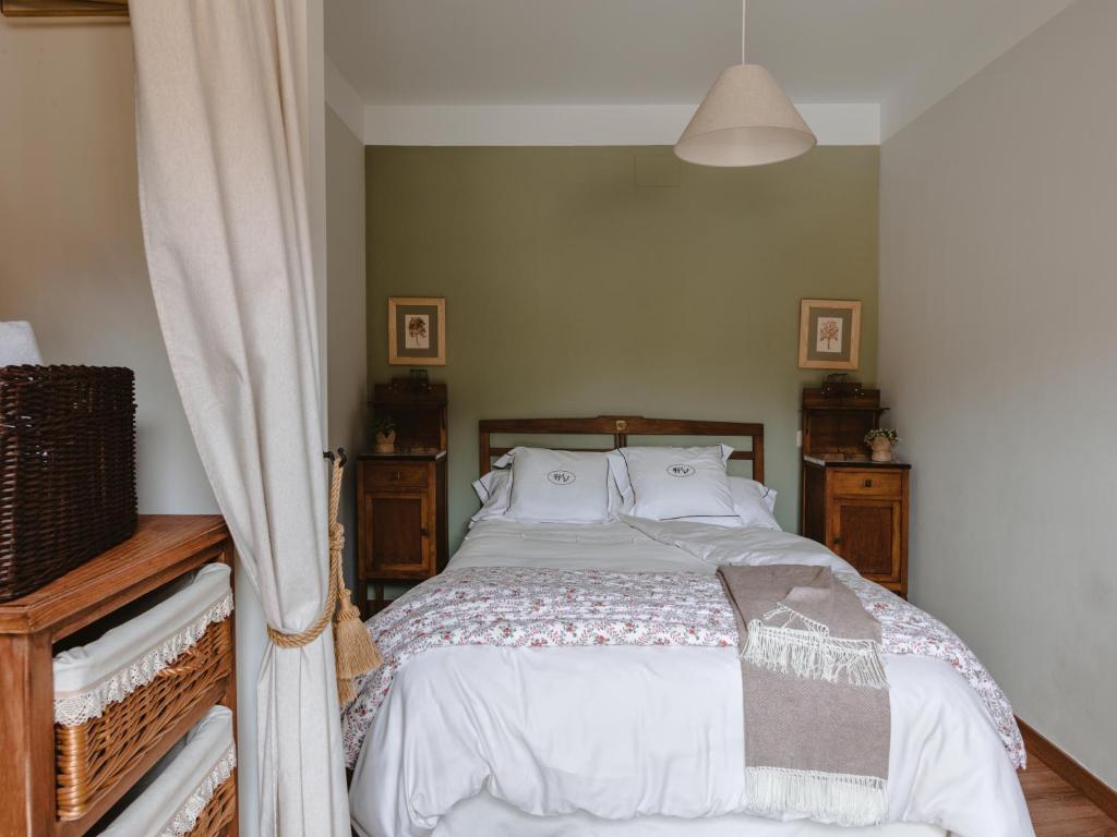 Cama o camas de una habitación en Hospedería del Valle Boutique Apartments