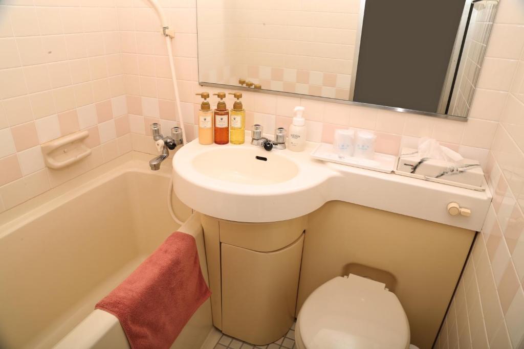 Koupelna v ubytování Hotel Belle-Cour Inomata