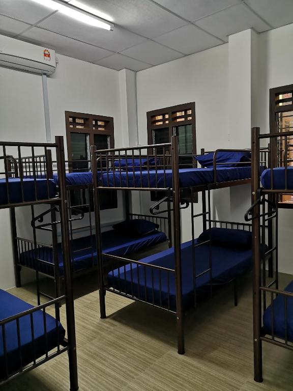 Postel nebo postele na pokoji v ubytování Homey Hostel, Ipoh Town