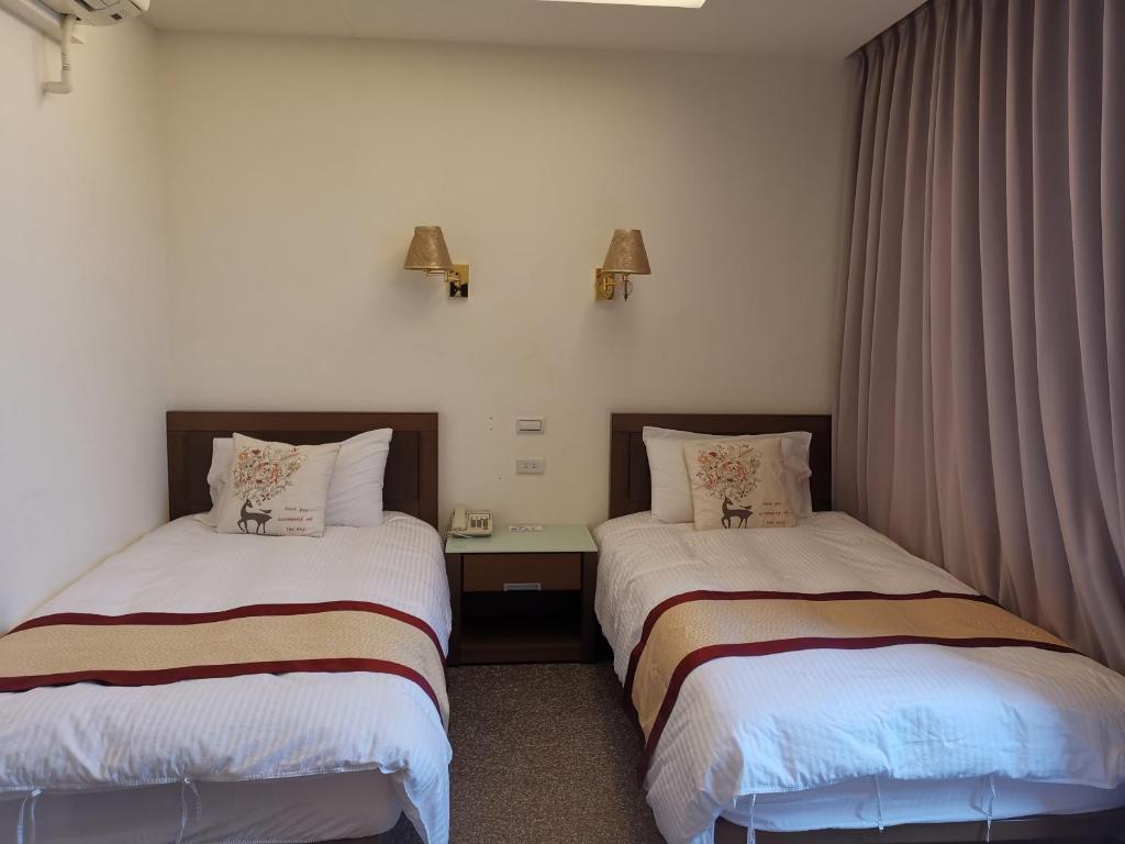 Postel nebo postele na pokoji v ubytování Mu Xi Ocean View B&B