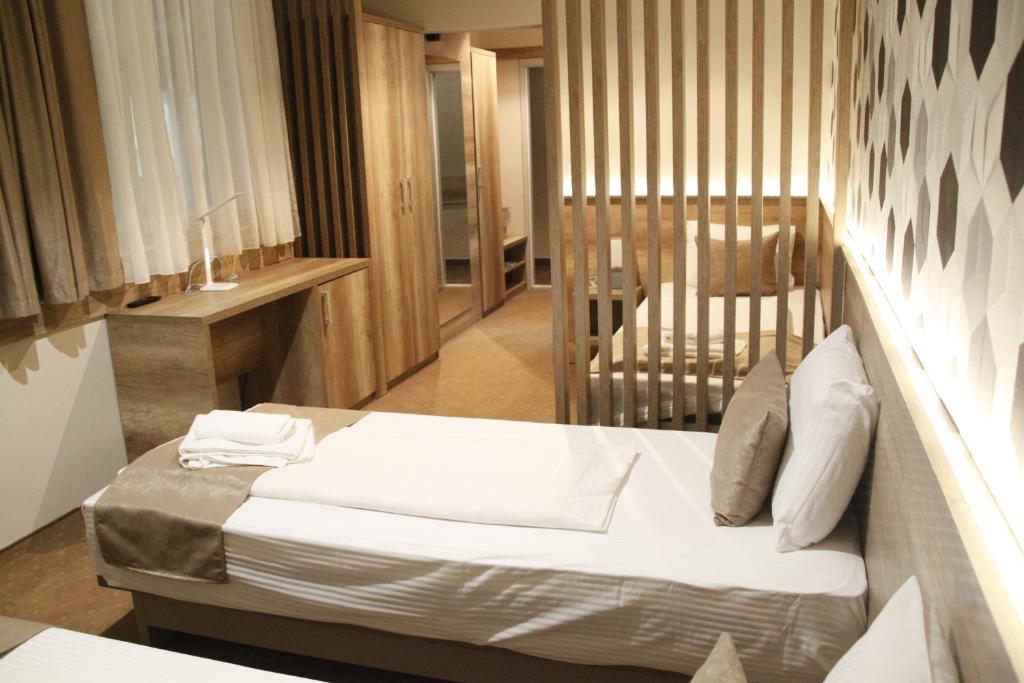 Postel nebo postele na pokoji v ubytování Student Hotel Mostar