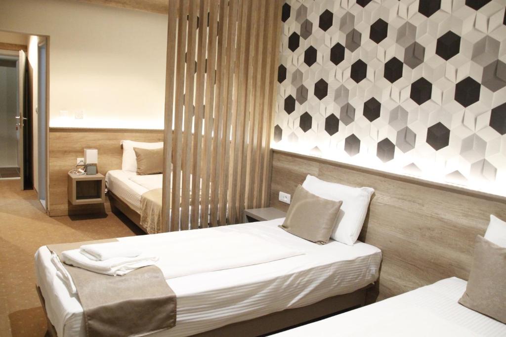 Postel nebo postele na pokoji v ubytování Student Hotel Mostar