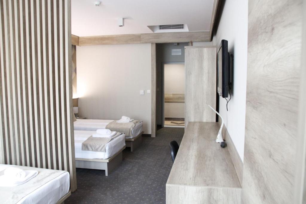 Postel nebo postele na pokoji v ubytování Student Hotel Mostar