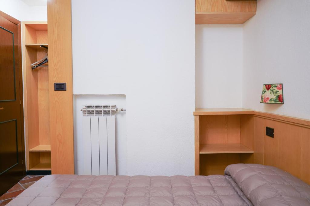 Postel nebo postele na pokoji v ubytování Hotel Daniel
