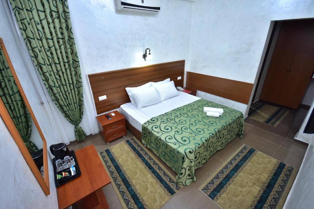Postel nebo postele na pokoji v ubytování Hotel Chao