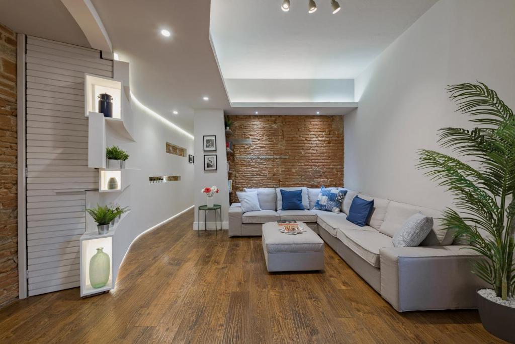 A seating area at - Guelfa Apartment -