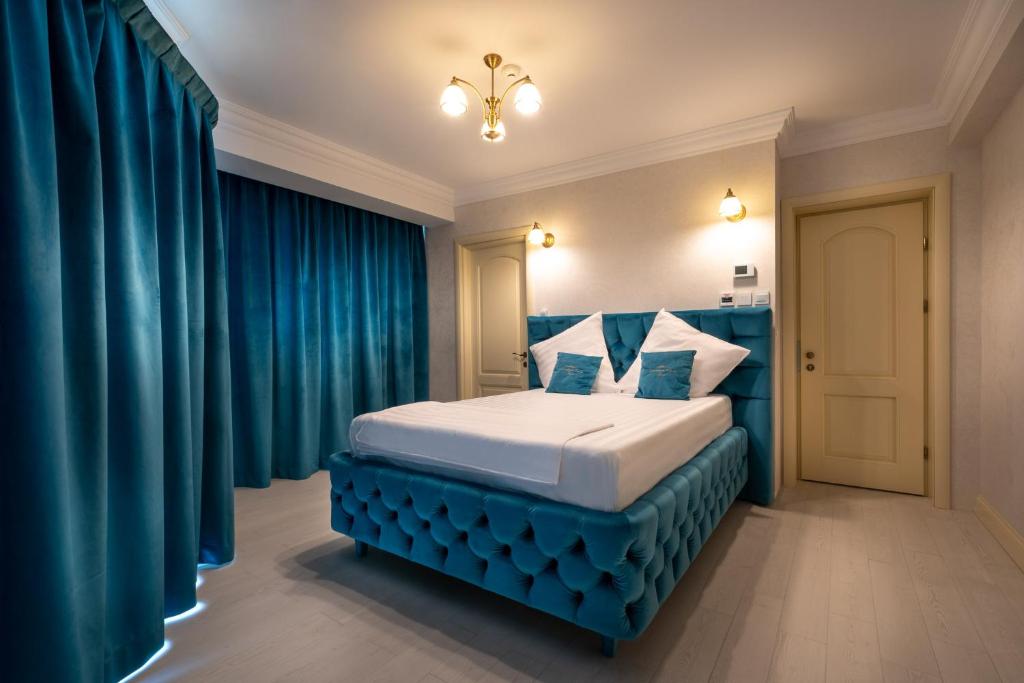 Postel nebo postele na pokoji v ubytování Hotel Casa Fiori