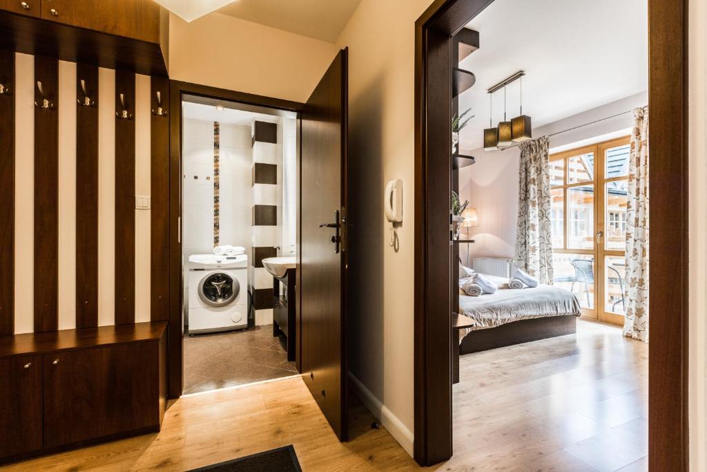 Posteľ alebo postele v izbe v ubytovaní Apartament Górski Deluxe Odkryj Zakopane