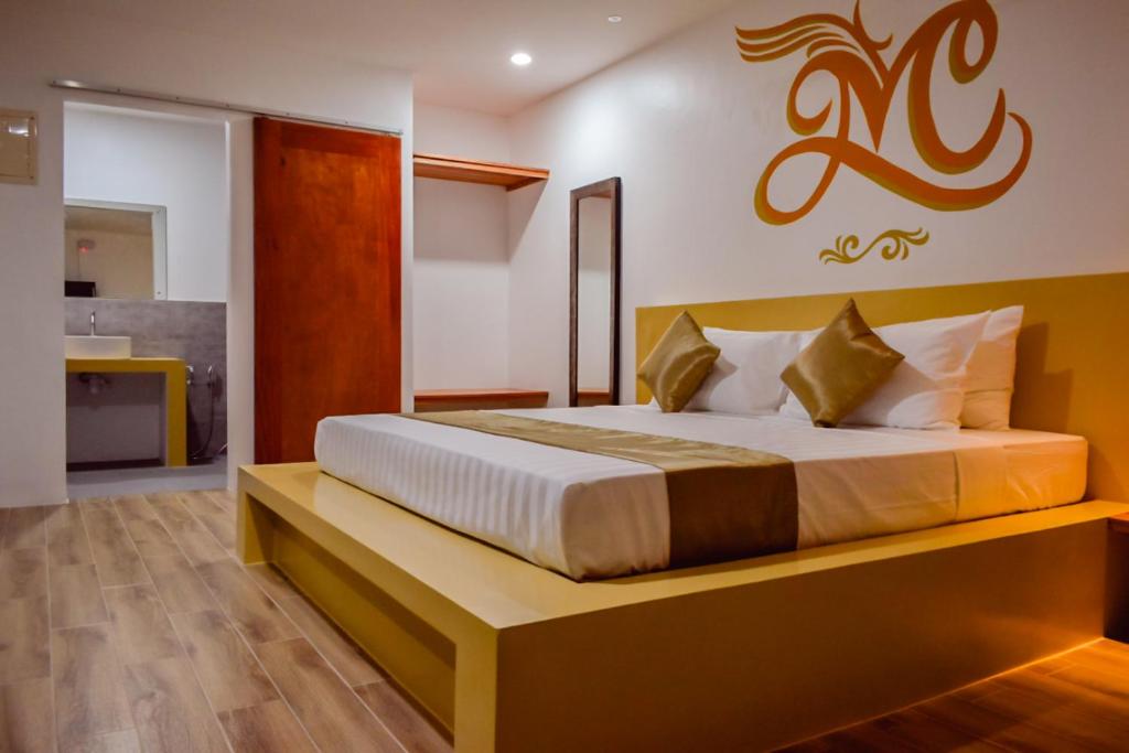 Postel nebo postele na pokoji v ubytování Montecarlo Villas Panglao