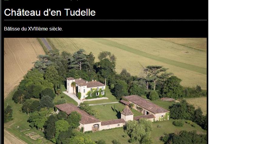 an aerial view of a large house in a field at DOMAINE D'ENTUDELLE in Lussan
