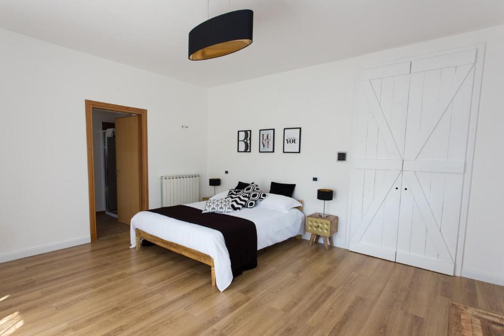 Postel nebo postele na pokoji v ubytování GUEST HOUSE IL LEONE