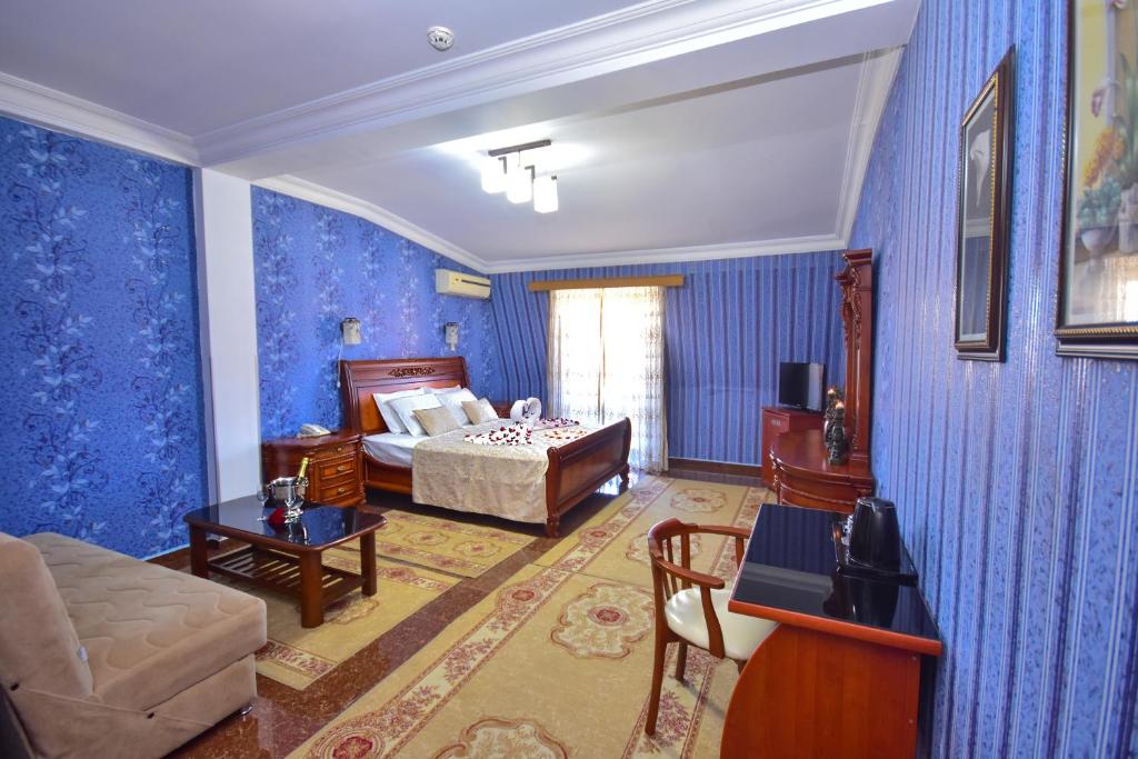 Postel nebo postele na pokoji v ubytování Hotel Chao