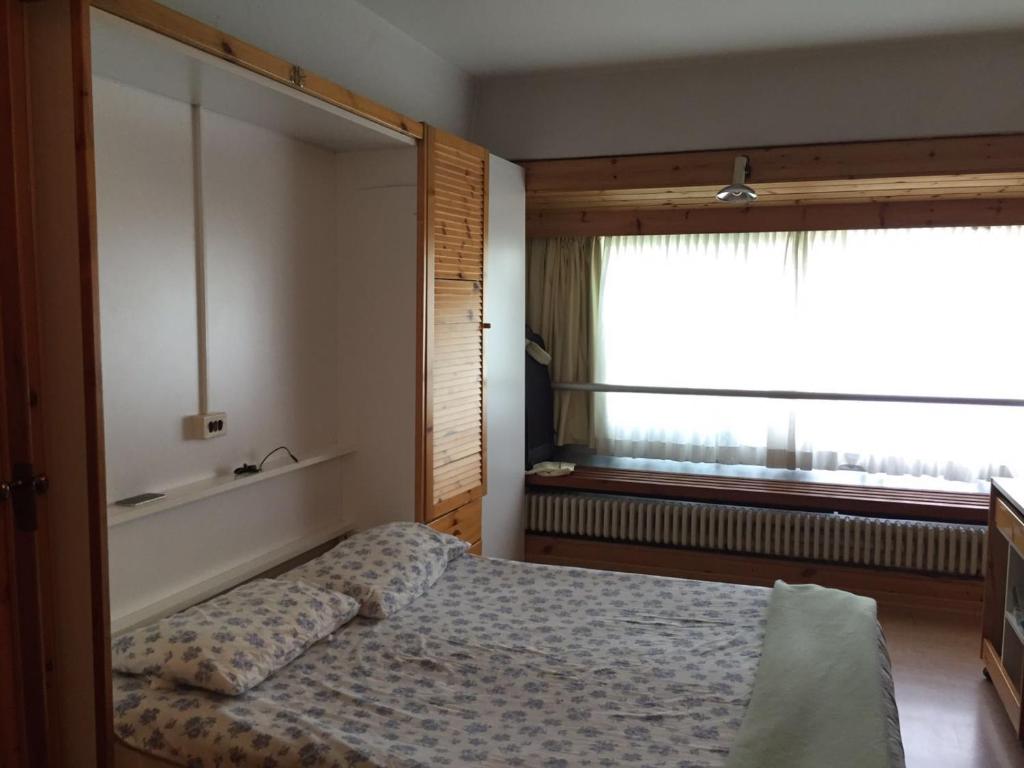 Postel nebo postele na pokoji v ubytování Marilleva 1400