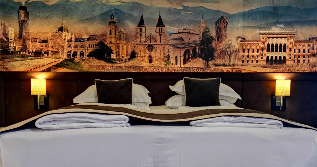 Postel nebo postele na pokoji v ubytování Hotel President Sarajevo