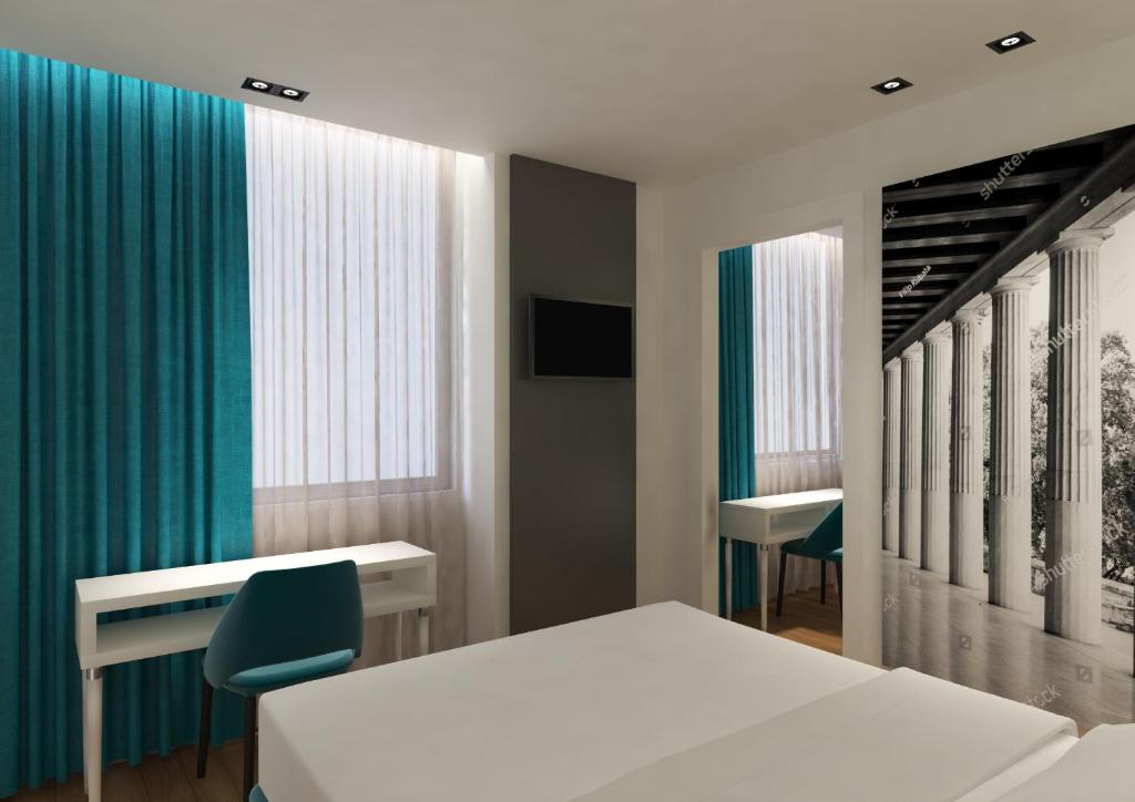 Postel nebo postele na pokoji v ubytování Athenian Montaza Hotel