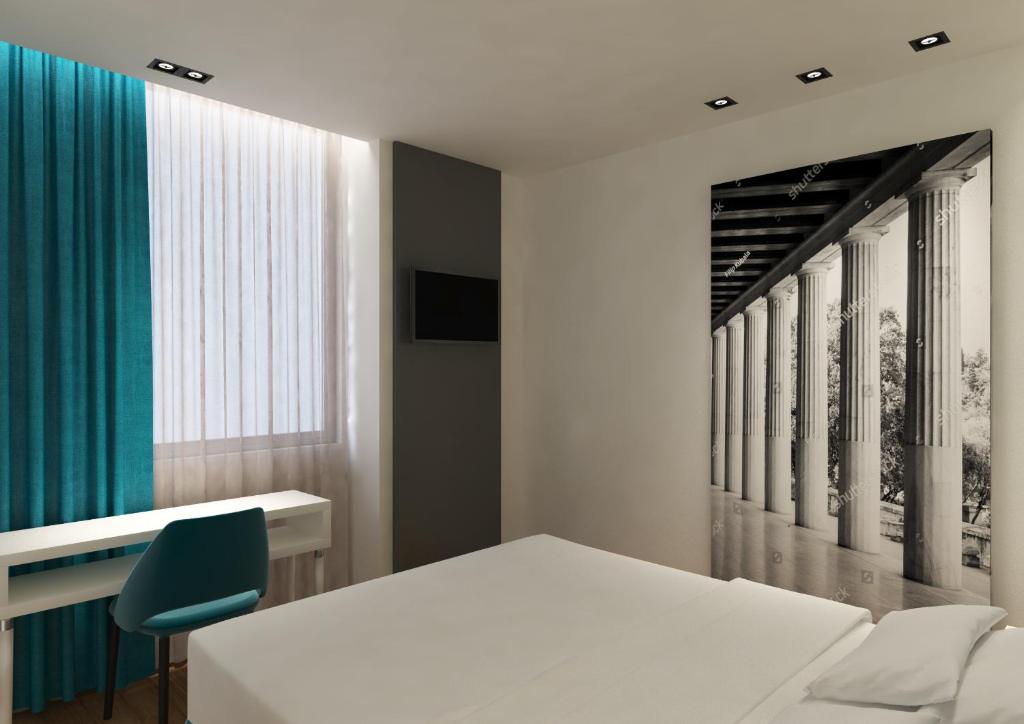 Postel nebo postele na pokoji v ubytování Athenian Montaza Hotel