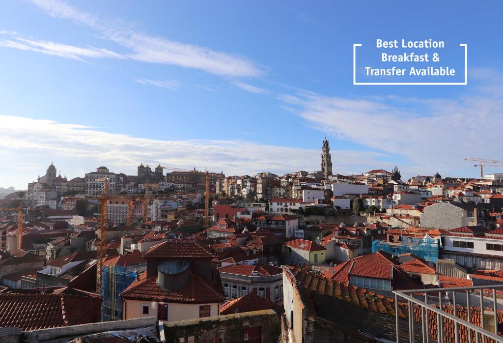 a cityscape of a city with buildings in the sky at HM - OPorto City View in Porto