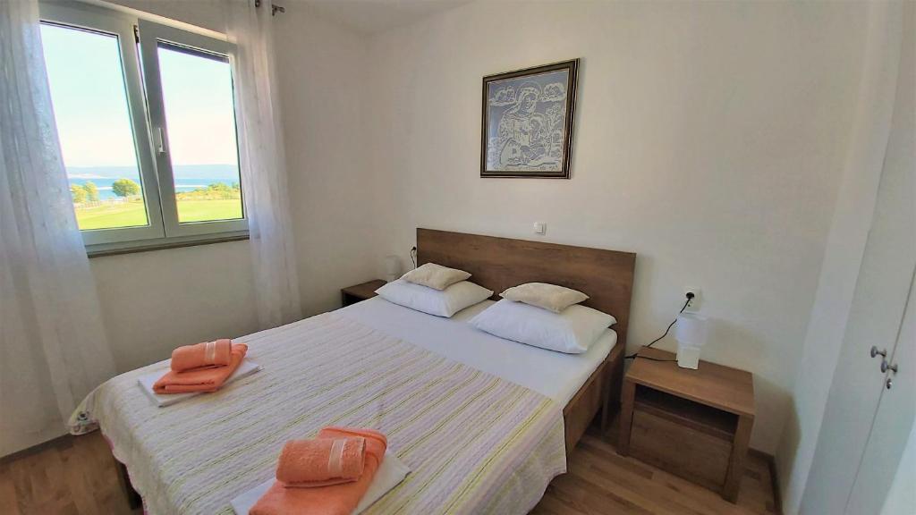 Posteľ alebo postele v izbe v ubytovaní Apartment Ribnjak 10