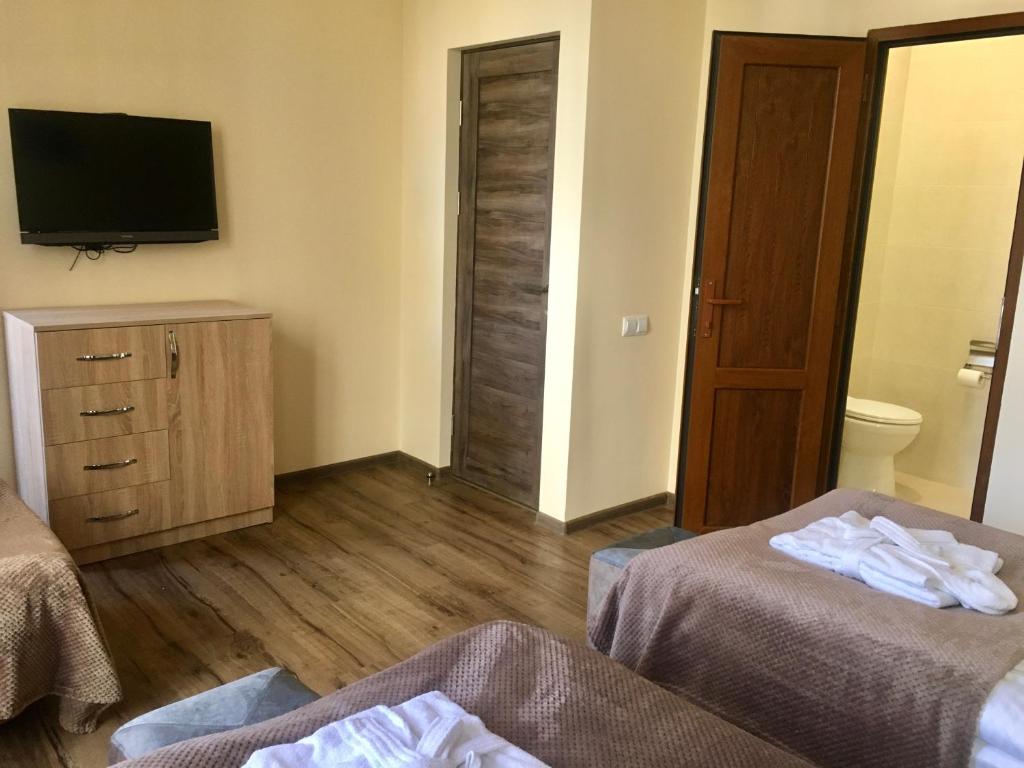 Postel nebo postele na pokoji v ubytování Guest House MARGARYAN